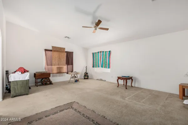 a room with furniture and a window