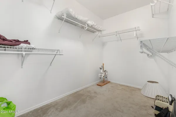 a work room with furniture and gym equipment