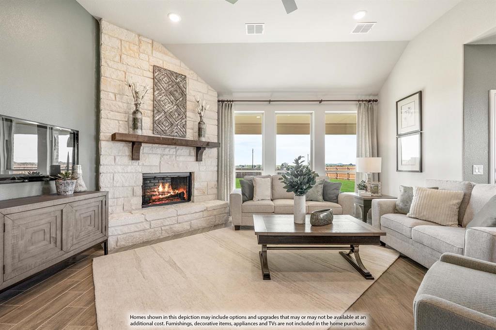 5214 Stone Lane Midlothian, TX 76065 - Photo 18 of 40 a living room with furniture and a fireplace