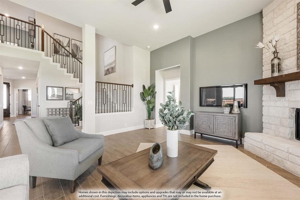 5214 Stone Lane Midlothian, TX 76065 - Photo 22 of 40 a living room with furniture and a wooden floor