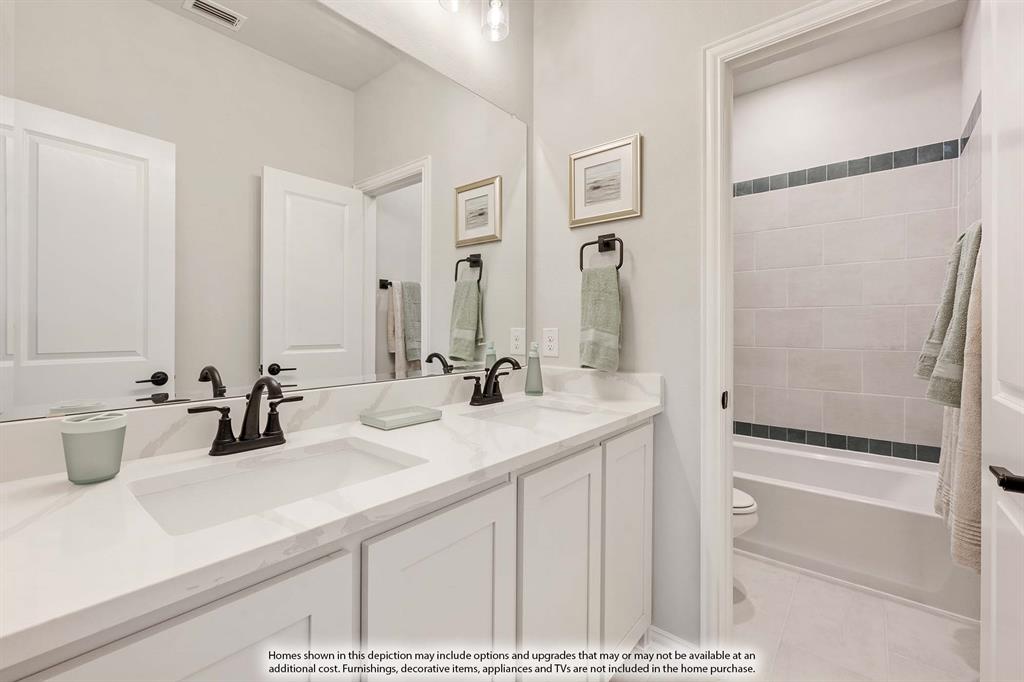 5214 Stone Lane Midlothian, TX 76065 - Photo 39 of 40 a bathroom with a double vanity sink mirror and shower