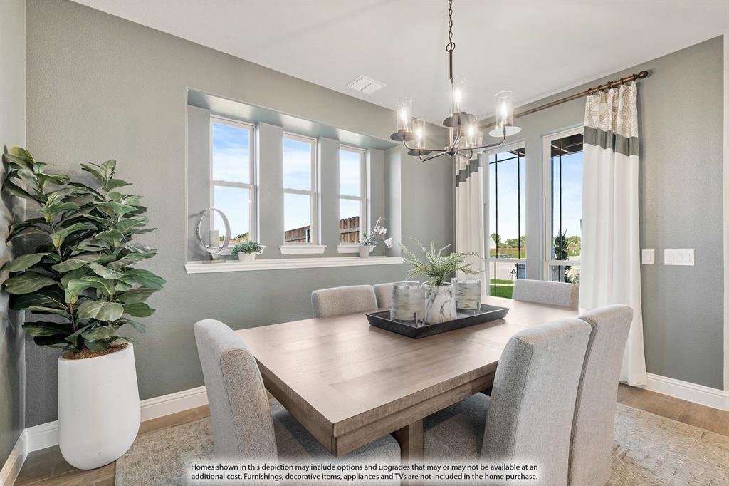 5214 Stone Lane Midlothian, TX 76065 - Photo 7 of 40 a living room with furniture and a chandelier