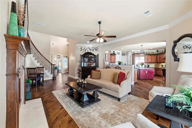 a large kitchen with a table and chairs