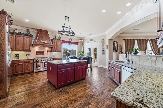 a spacious bedroom with a bed and a fireplace