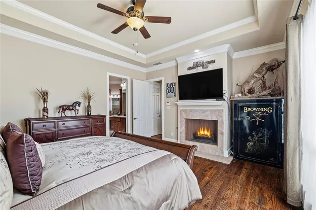 a view of walk in closet with clothes