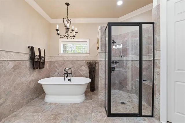 a bathroom with a granite countertop sink a mirror and a shower