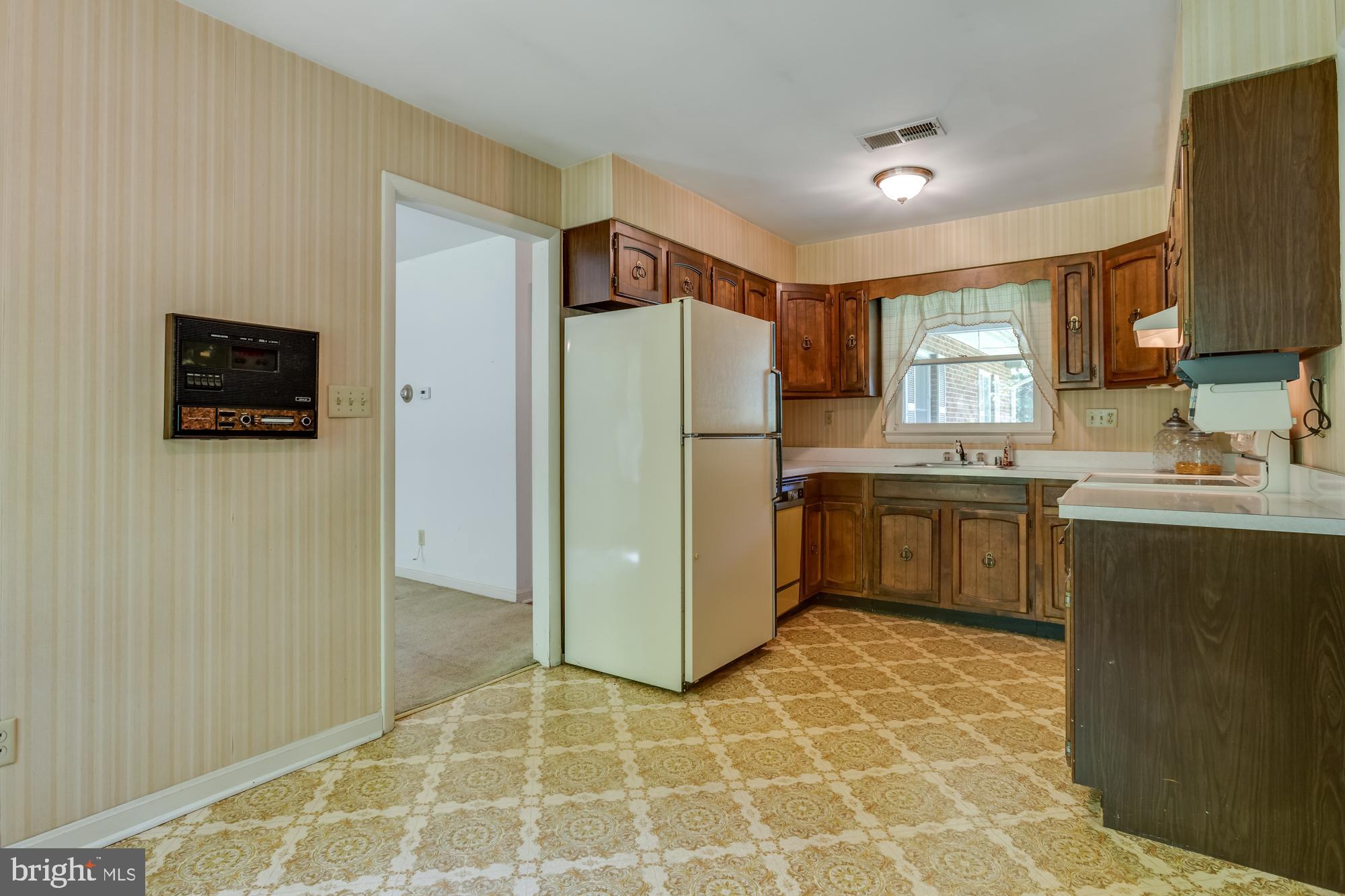 4509 Shirley Gate Road Fairfax, VA 22030 - Photo 15 of 47 Kitchen Opens To Dining Room W/ Room For Expansion