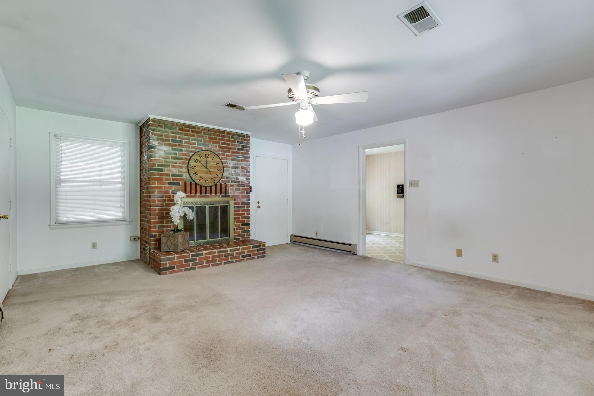 4509 Shirley Gate Road Fairfax, VA 22030 - Photo 19 of 47 Family Room W/ Wood Burning Brick Fireplace