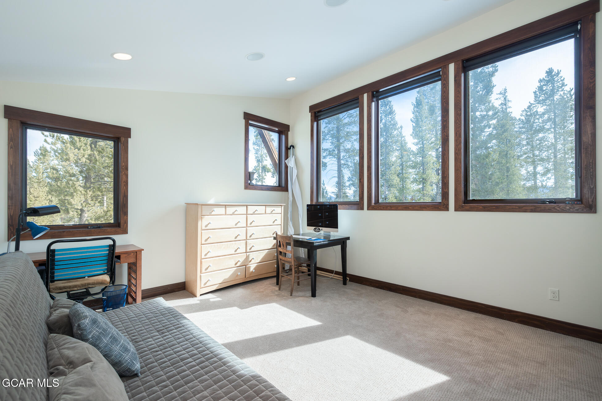 492 Mountain Peak Road Tabernash, CO 80478 - Photo 14 of 29 a bedroom with a bed and a window