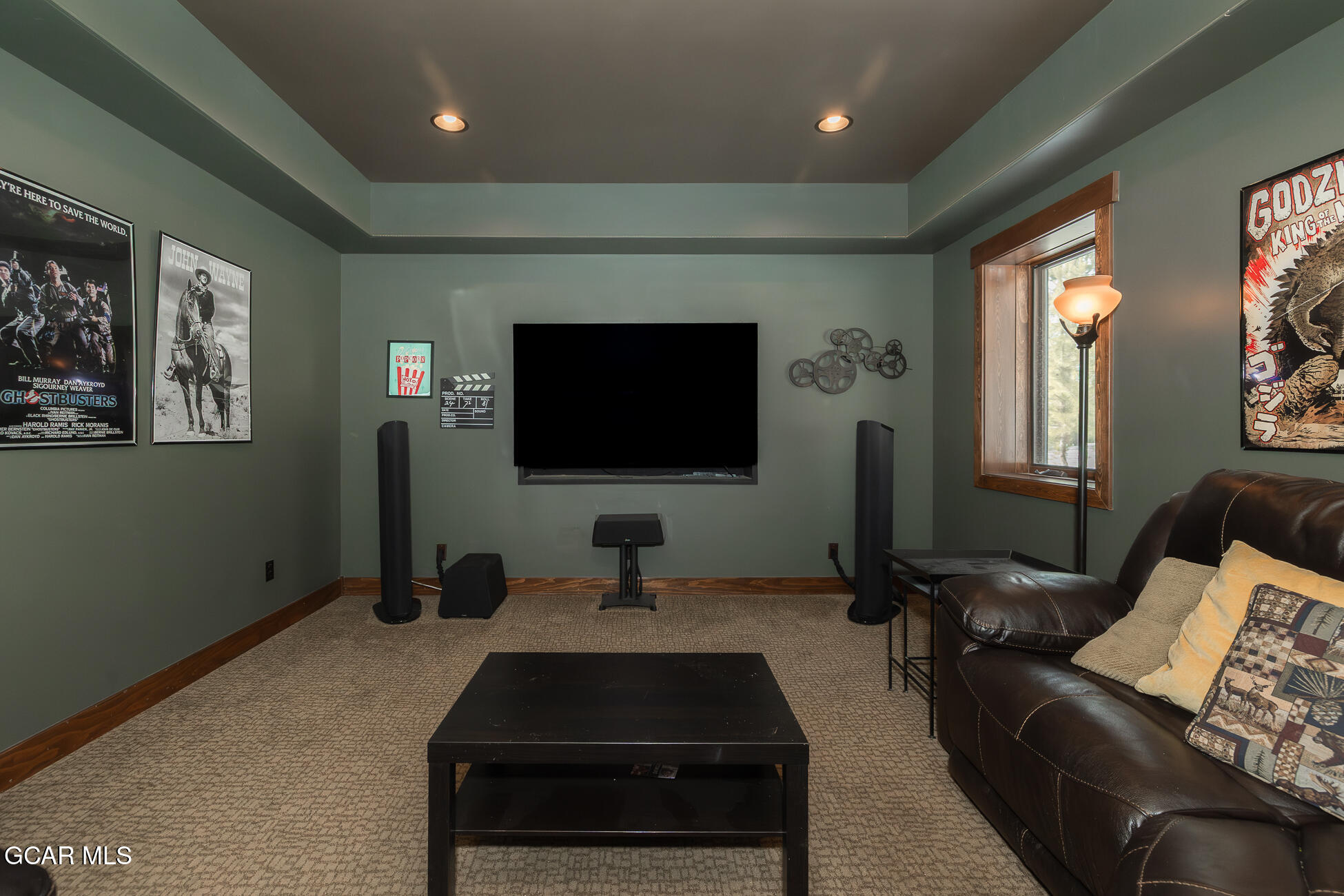 492 Mountain Peak Road Tabernash, CO 80478 - Photo 16 of 29 a living room with furniture and a flat screen tv