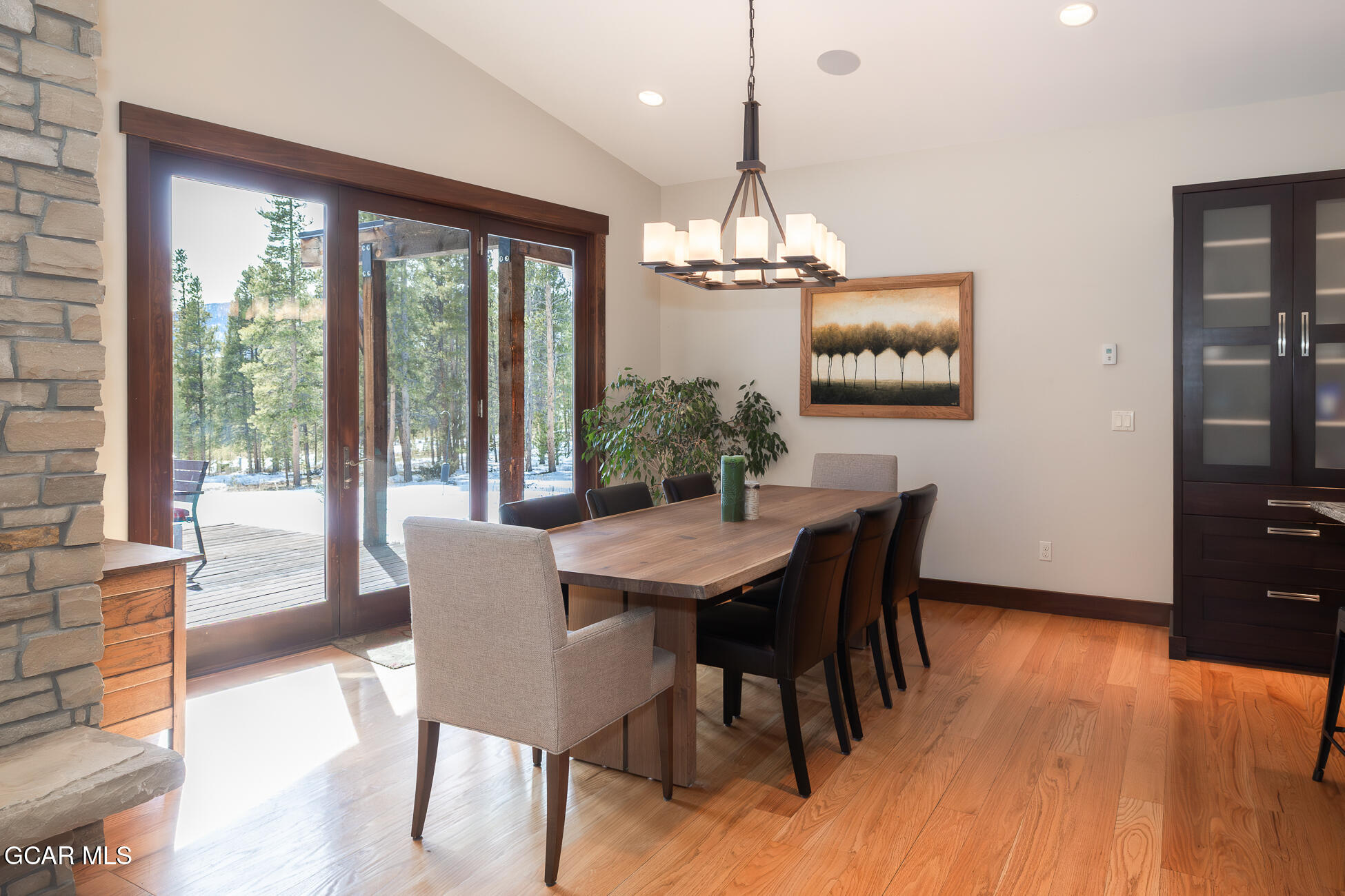 492 Mountain Peak Road Tabernash, CO 80478 - Photo 20 of 29 a view of a dining room with furniture window and wooden floor