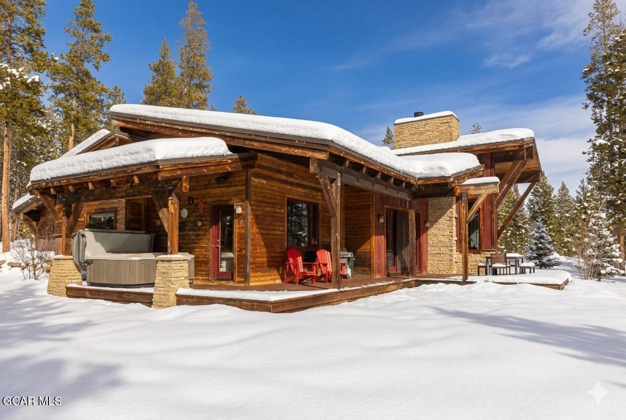 492 Mountain Peak Road Tabernash, CO 80478 - Photo 2 of 29 a view of a building with traffic signal