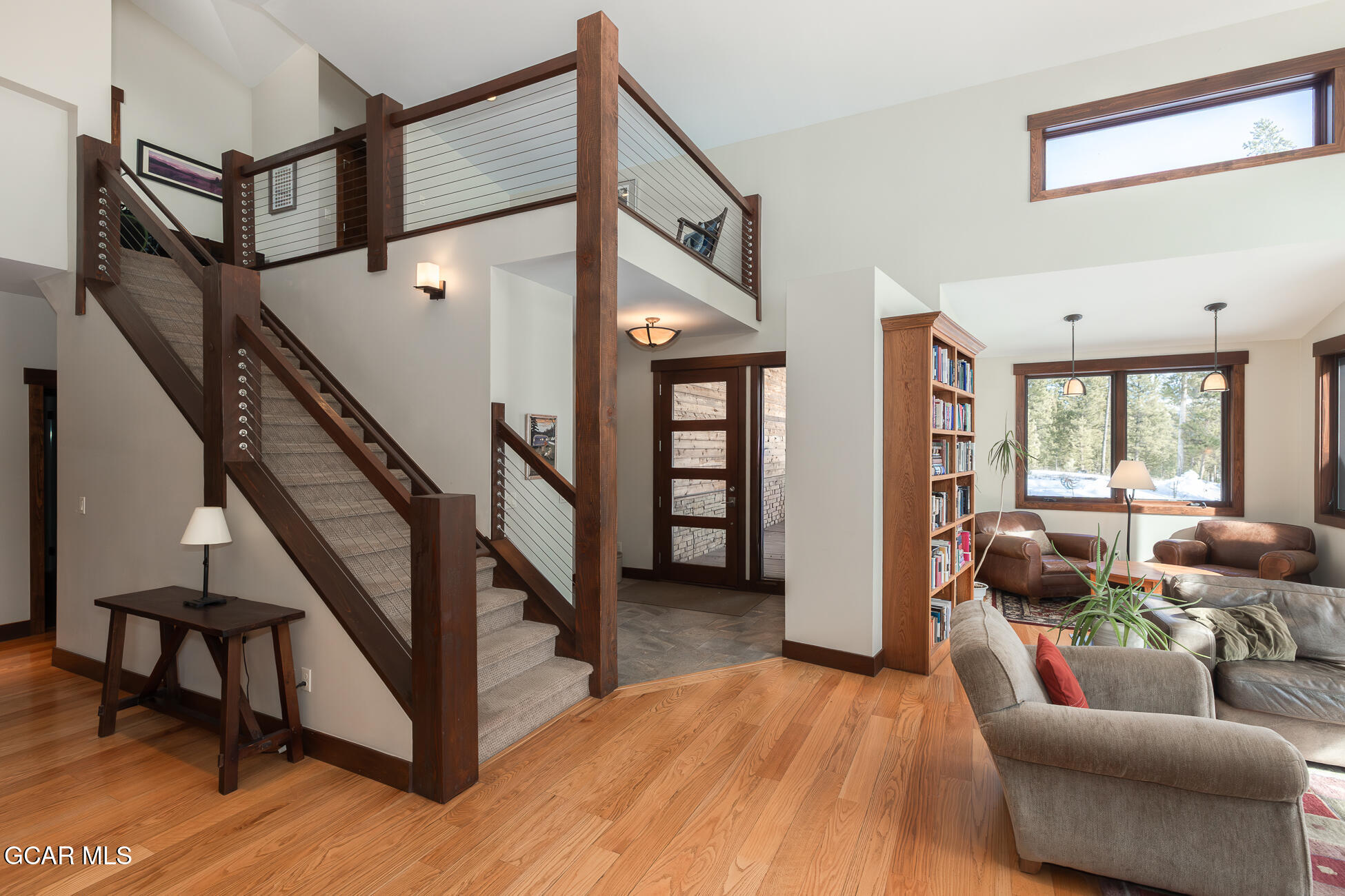 492 Mountain Peak Road Tabernash, CO 80478 - Photo 22 of 29 a living room with furniture and a wooden floor