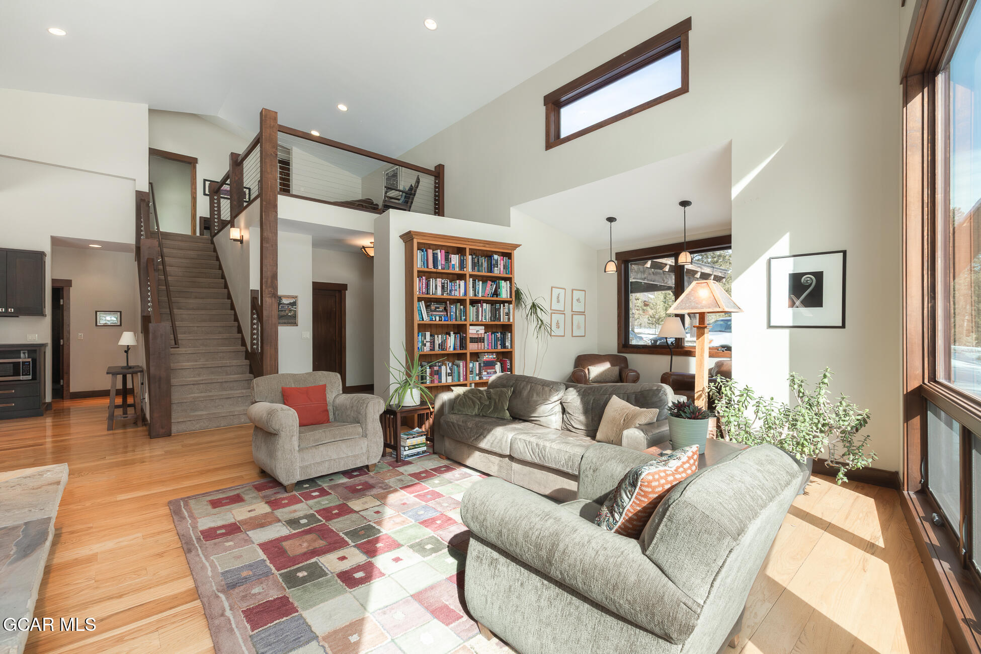 492 Mountain Peak Road Tabernash, CO 80478 - Photo 23 of 29 a living room with furniture and a rug