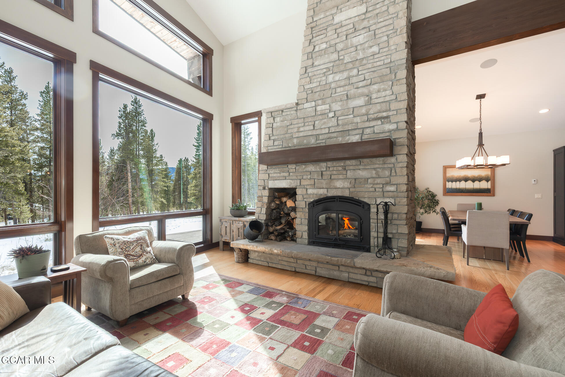 492 Mountain Peak Road Tabernash, CO 80478 - Photo 24 of 29 a living room with furniture and a fireplace