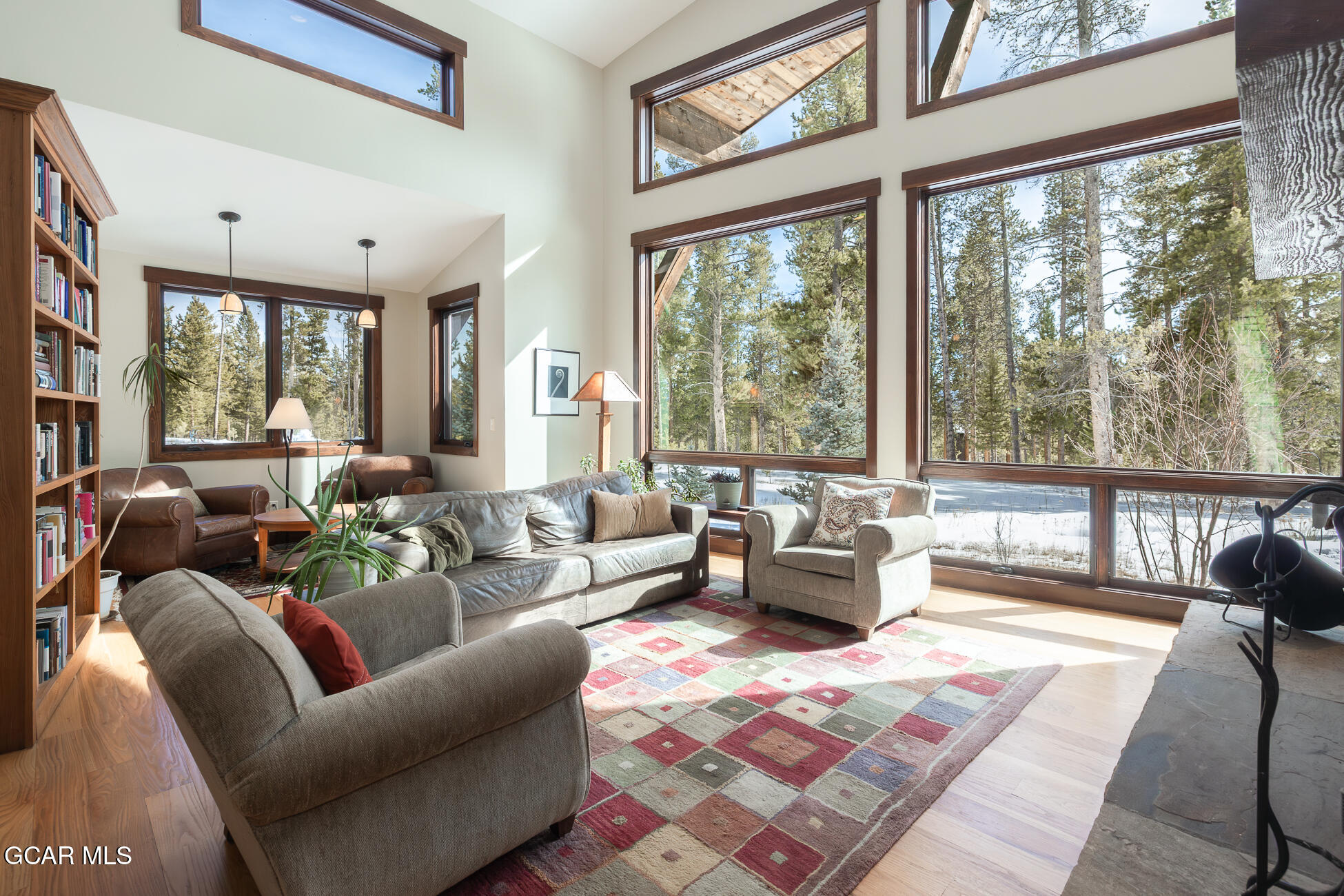 492 Mountain Peak Road Tabernash, CO 80478 - Photo 6 of 29 a living room with furniture and a large window