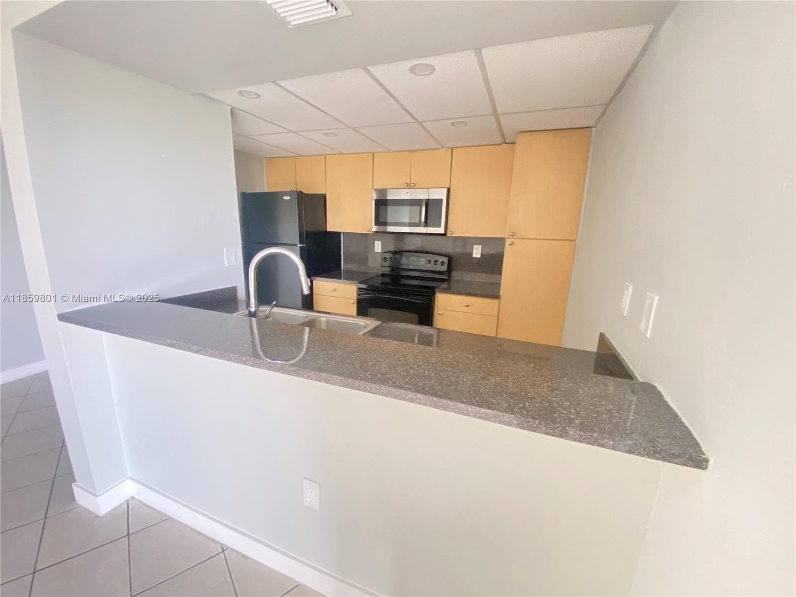 7125 Northwest 186th Street, Unit B304 Hialeah, FL 33015 - Photo 2 of 27