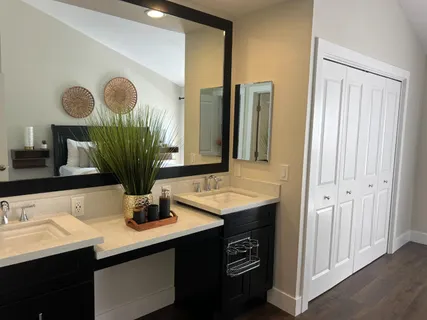 a bathroom with a sink and a mirror