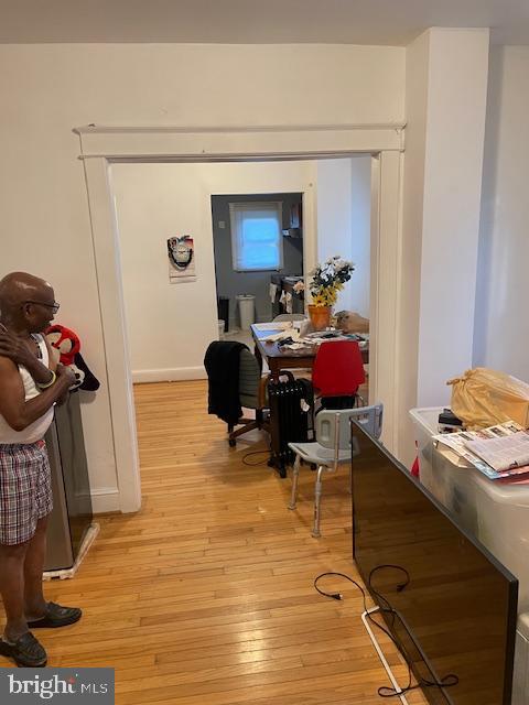 66 53rd Place Southeast Washington, DC 20019 - Photo 3 of 9 a view of a workspace with furniture and a window