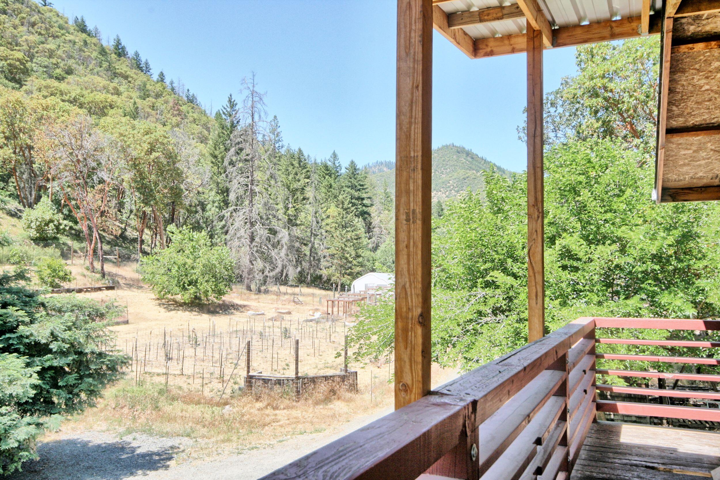 2231 Humbug Creek Road Jacksonville, OR 97530 - Photo 39 of 80 a view of balcony with furniture
