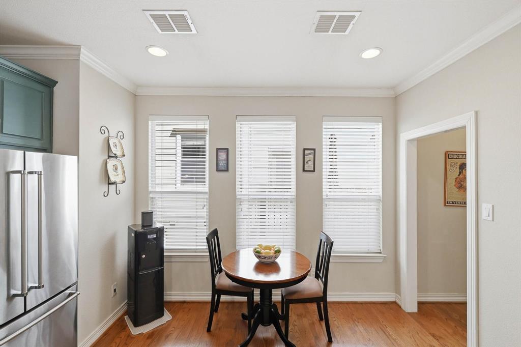 2619 Colby Street, Unit B Dallas, TX 75204 - Photo 11 of 34 a view of a room with a table and chairs