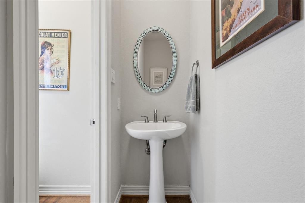 2619 Colby Street, Unit B Dallas, TX 75204 - Photo 12 of 34 a bathroom with a sink and a mirror