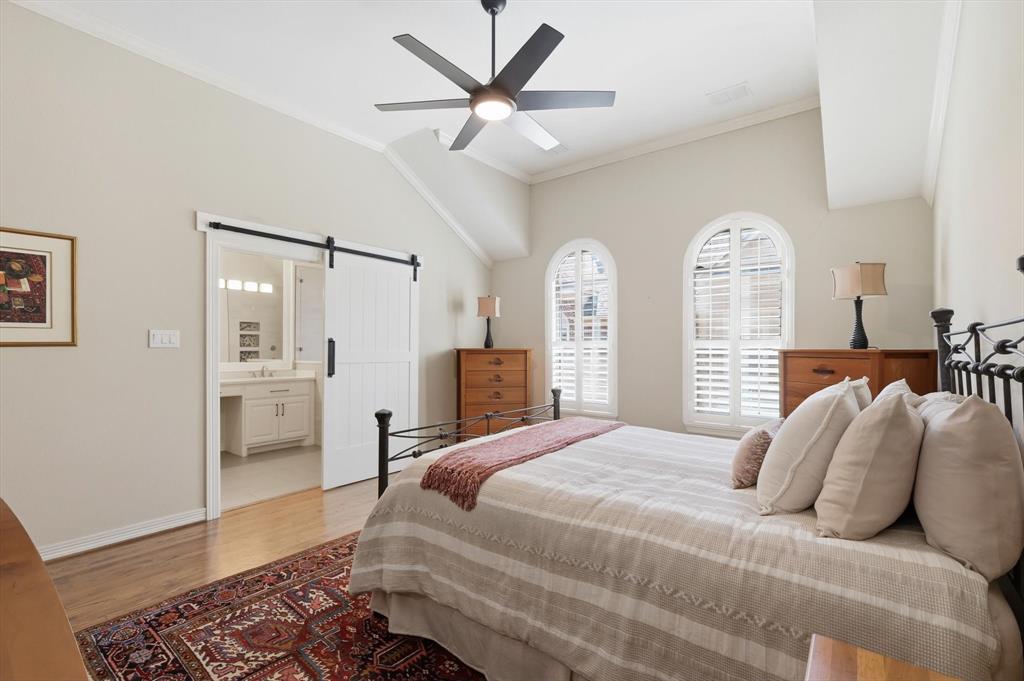 2619 Colby Street, Unit B Dallas, TX 75204 - Photo 14 of 34 a bedroom with a bed and a window