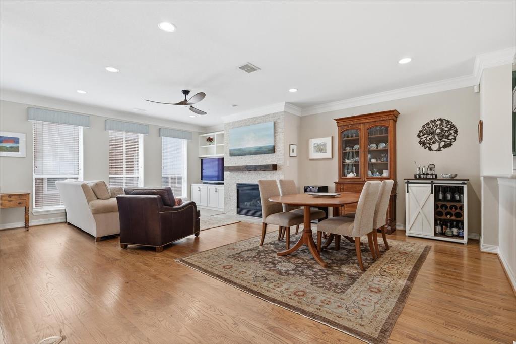 2619 Colby Street, Unit B Dallas, TX 75204 - Photo 2 of 34 a living room with furniture a rug and a fireplace