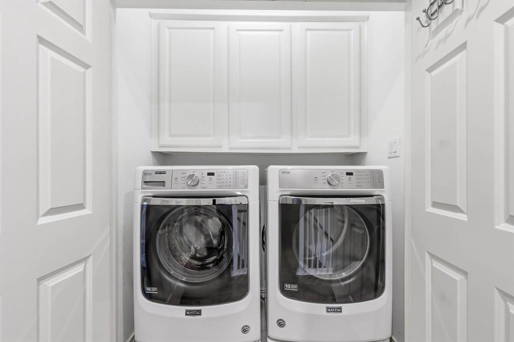 2619 Colby Street, Unit B Dallas, TX 75204 - Photo 21 of 34 a utility room with dryer and washer