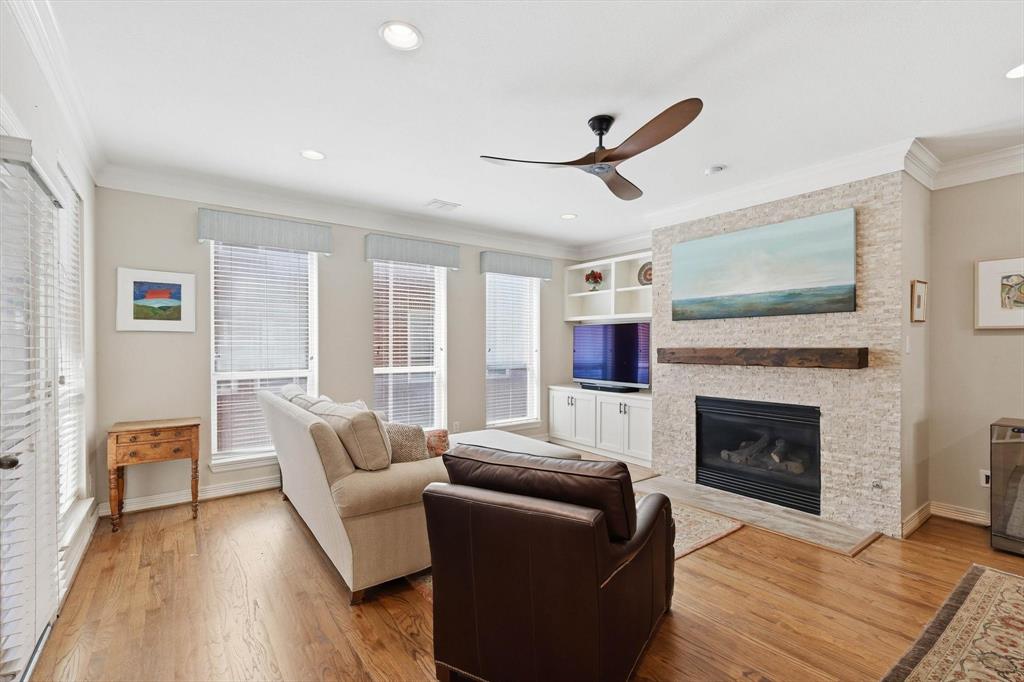 2619 Colby Street, Unit B Dallas, TX 75204 - Photo 5 of 34 a living room with furniture and a fireplace