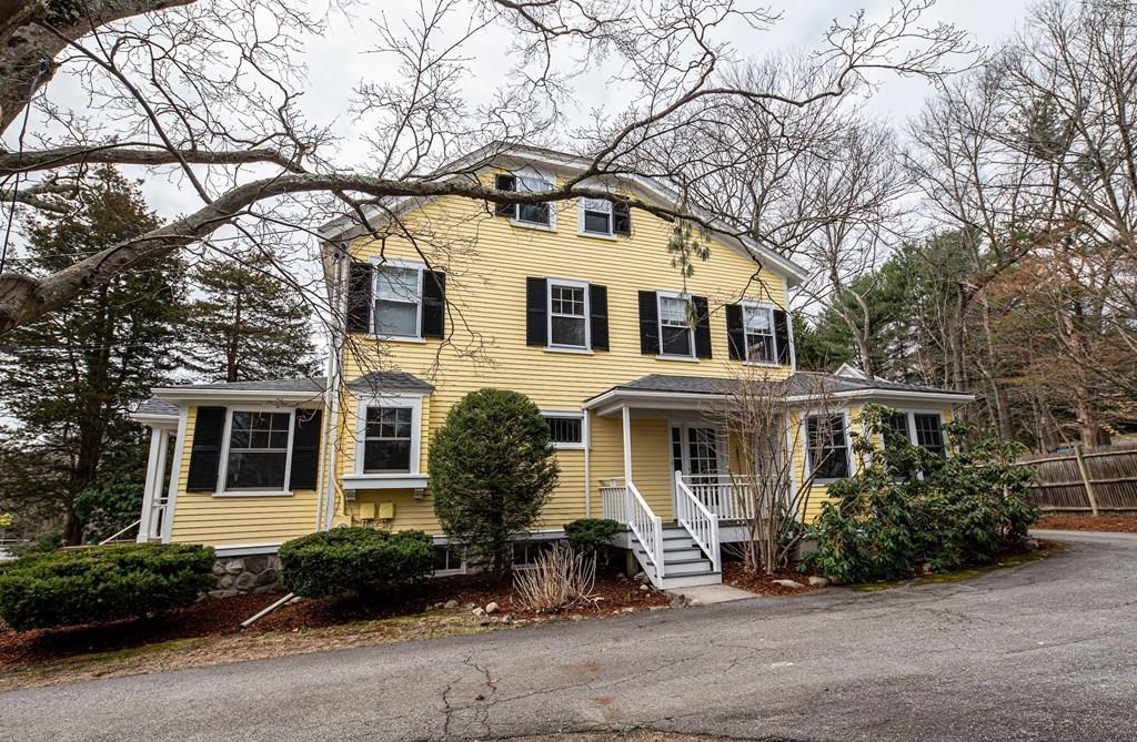 9 Blake Road Lexington, MA 02420 - Photo 1 of 41 a front view of a house with a yard