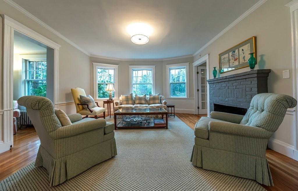 9 Blake Road Lexington, MA 02420 - Photo 12 of 41 a living room with furniture and a fireplace
