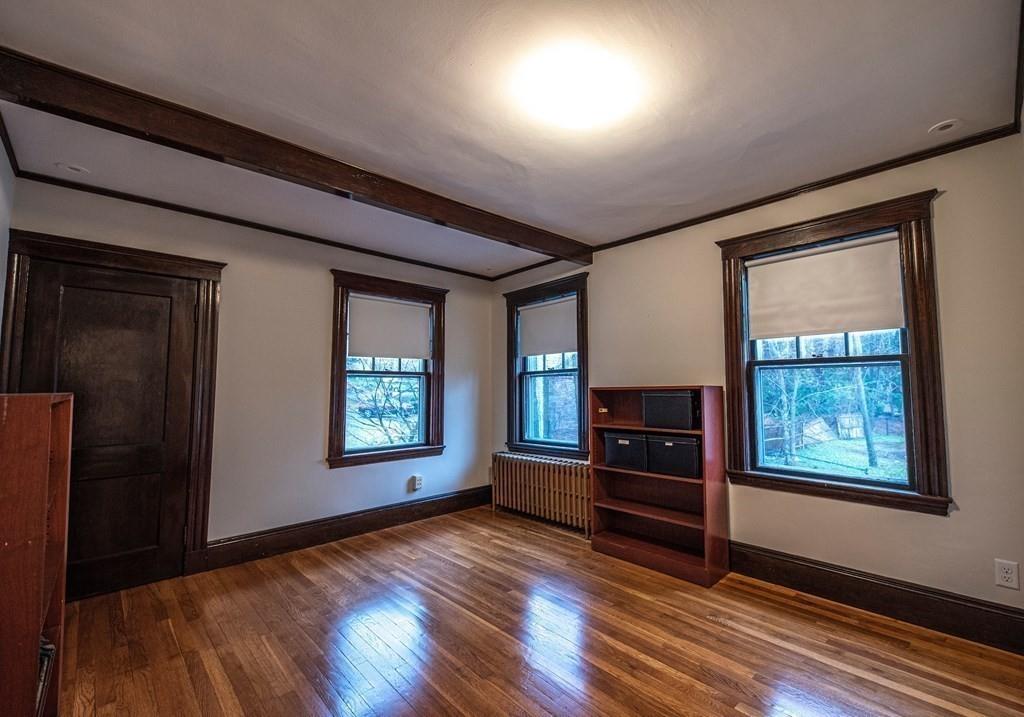 9 Blake Road Lexington, MA 02420 - Photo 31 of 41 wooden floor in an empty room with a window