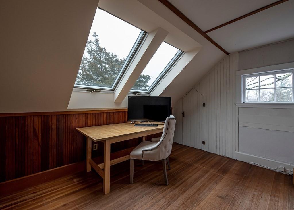 9 Blake Road Lexington, MA 02420 - Photo 37 of 41 a view of a workspace with furniture and a window