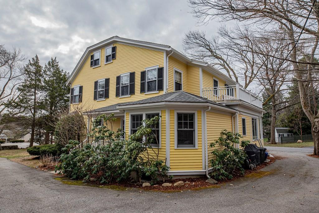9 Blake Road Lexington, MA 02420 - Photo 39 of 41 a front view of a house with a garden