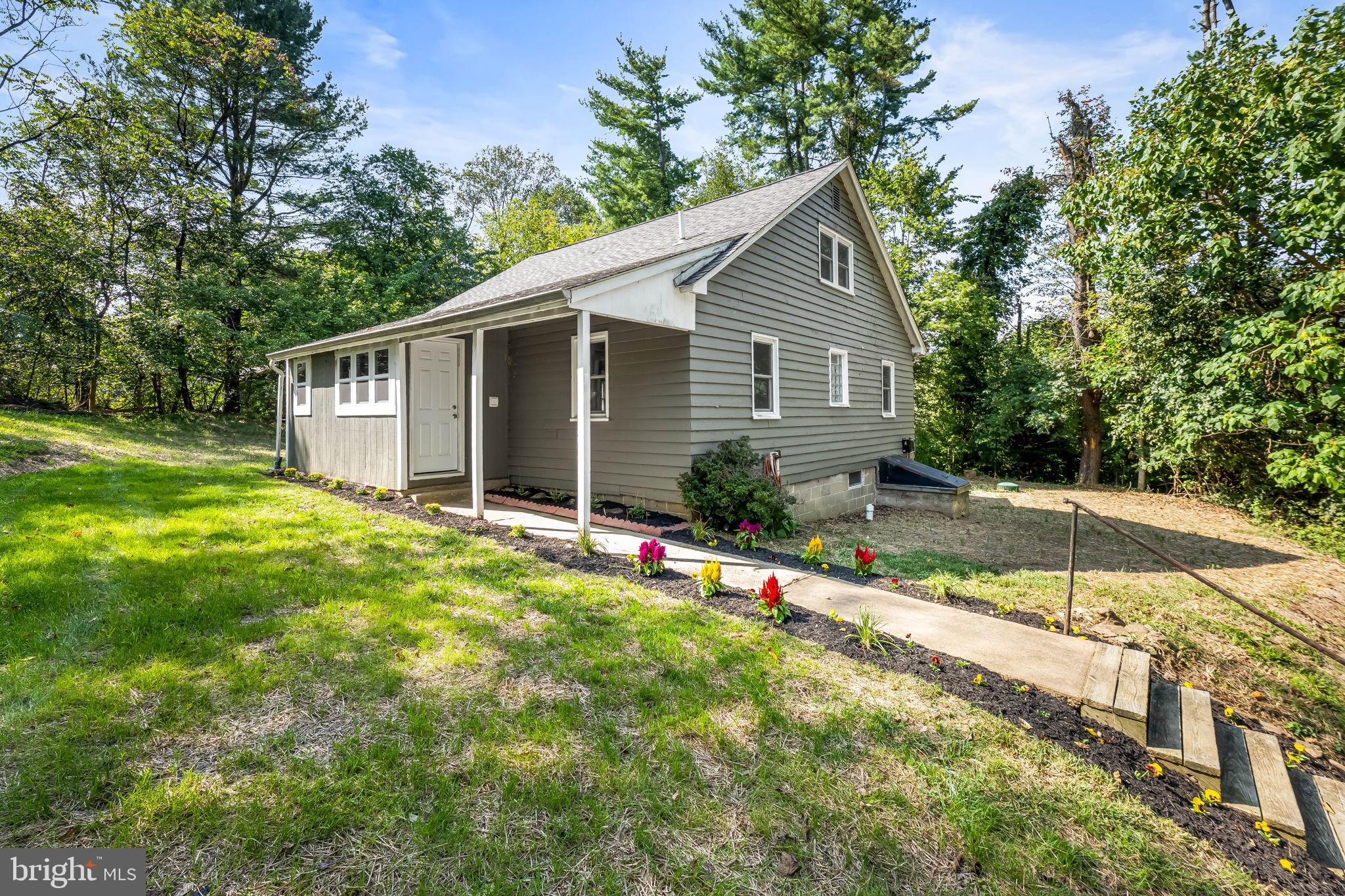 4831 Conowingo Road Darlington, MD 21034 - Photo 1 of 37 a view of a house with backyard and garden