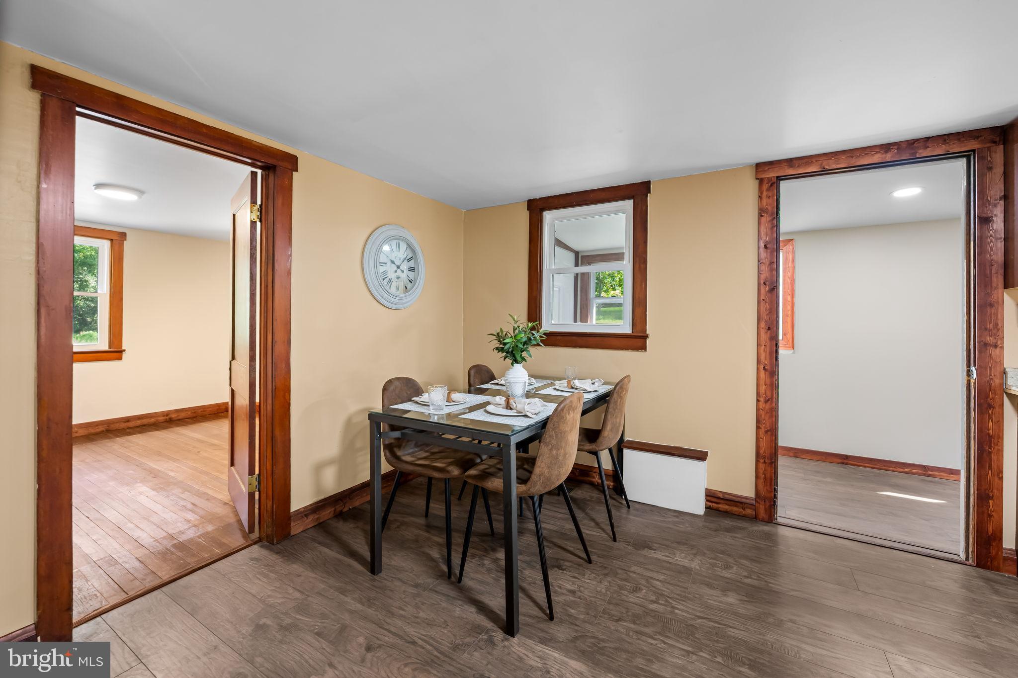 4831 Conowingo Road Darlington, MD 21034 - Photo 11 of 37 a view of a dining room with furniture and wooden floor