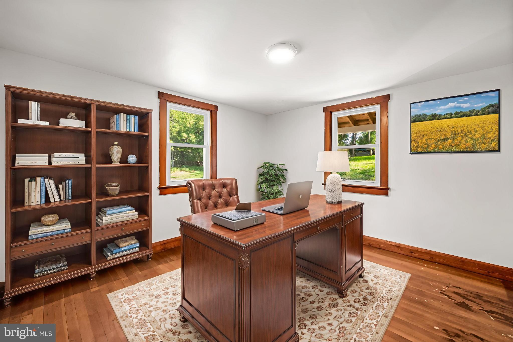 4831 Conowingo Road Darlington, MD 21034 - Photo 17 of 37 a view of a workspace with furniture and a window