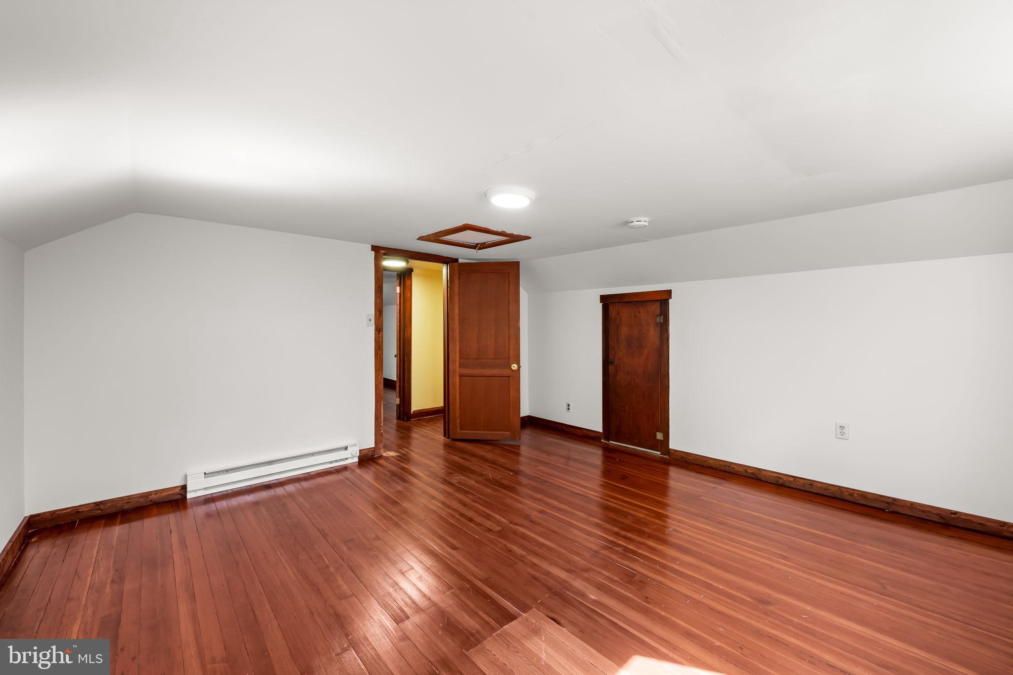 4831 Conowingo Road Darlington, MD 21034 - Photo 27 of 37 a view of an empty room with wooden floor