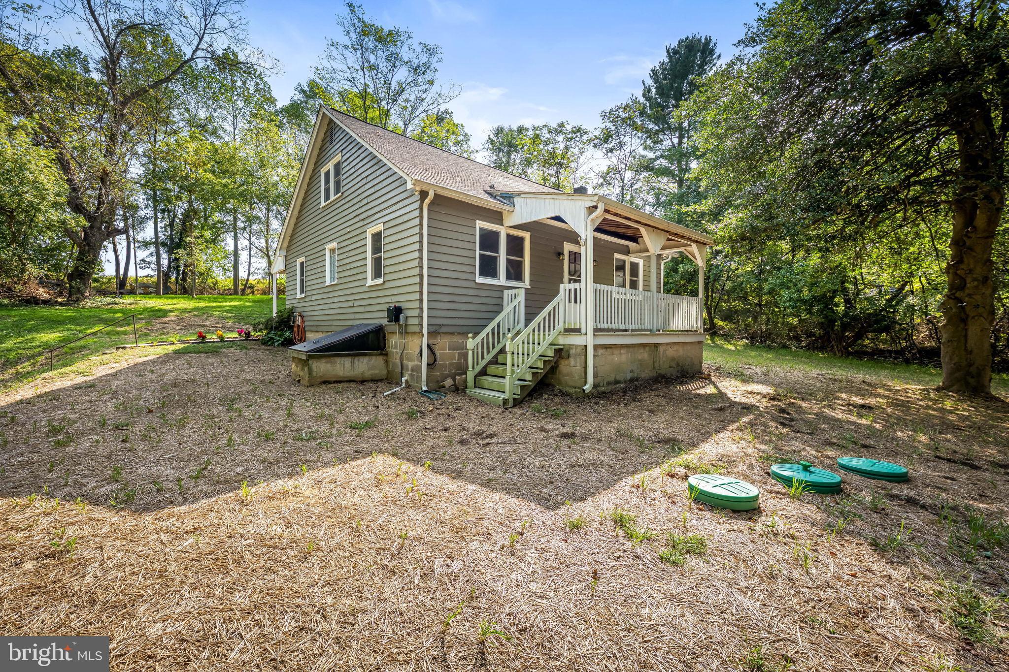4831 Conowingo Road Darlington, MD 21034 - Photo 35 of 37 a front view of a house with a yard
