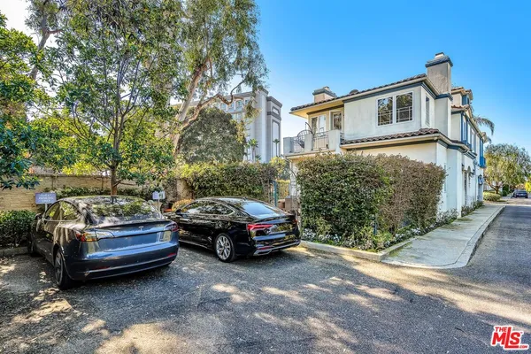 a car parked in front of a house