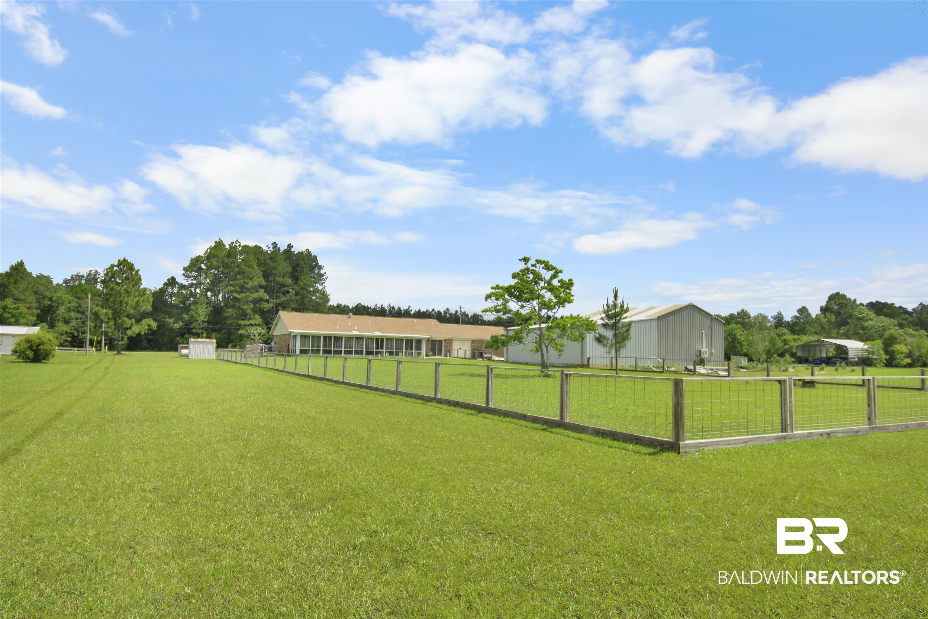 26850 Timber Lane Elberta, AL 36530 - Photo 27 of 33 View of yard featuring an outbuilding