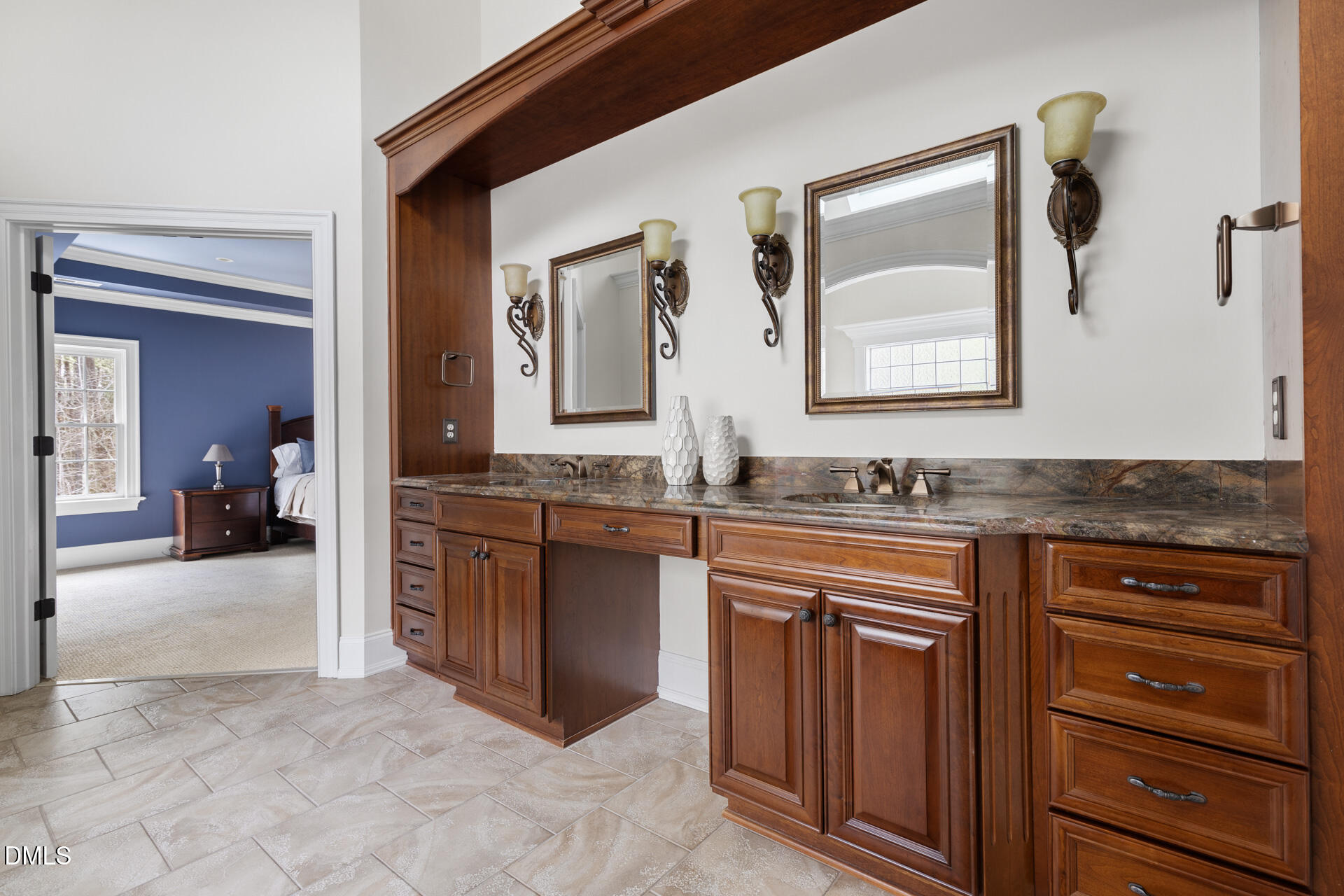 112 Winding Ridge Road Durham, NC 27713 - Photo 54 of 84 a spacious bathroom with a granite countertop sink and a mirror