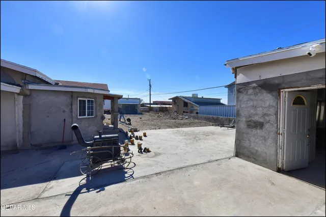 an aerial view of a house with a swimming pool