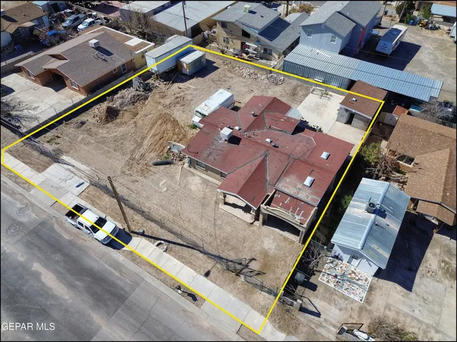 an aerial view of a building with outdoor space