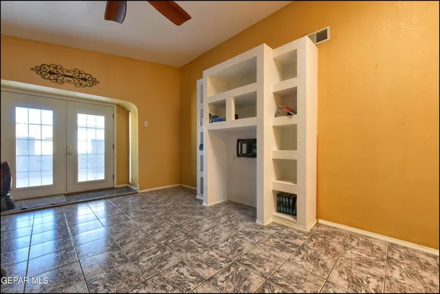 a kitchen with sink cabinets and appliances
