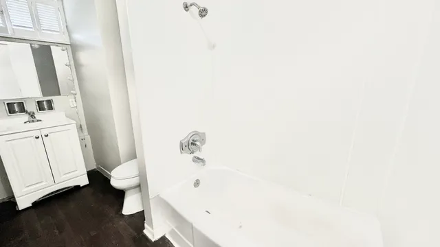 a bathroom with a sink and a tub