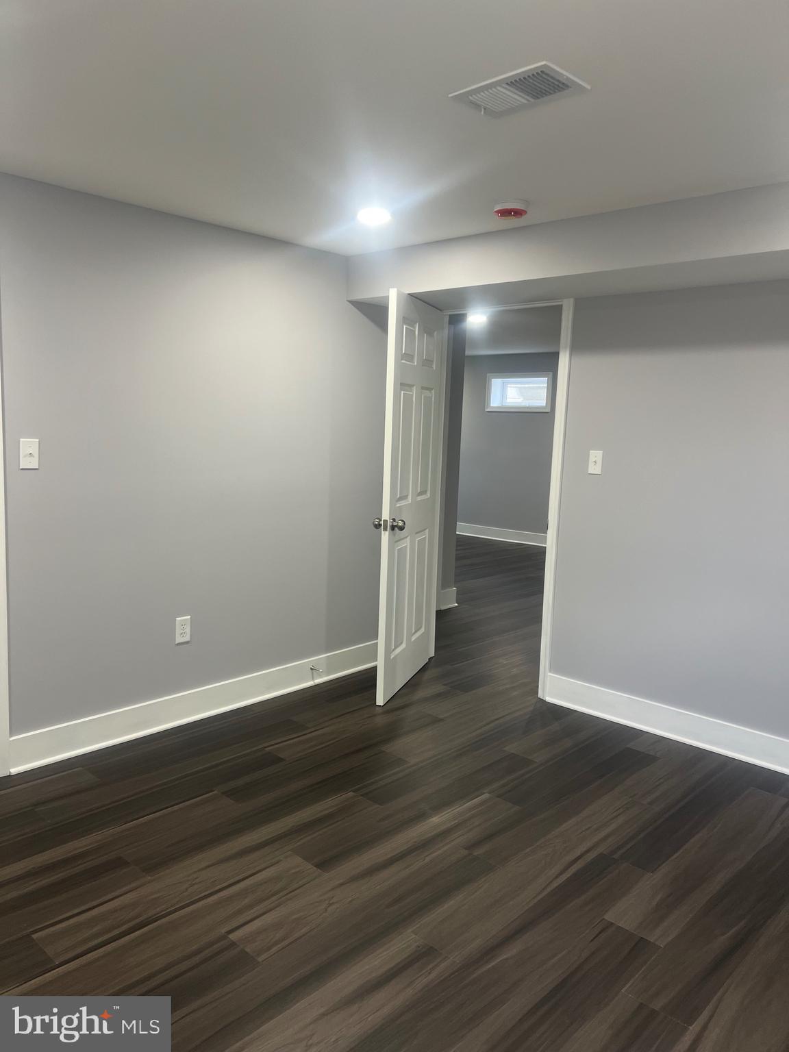 2600 Kingsway Road Fort Washington, MD 20744 - Photo 14 of 37 a view of an empty room with wooden floor
