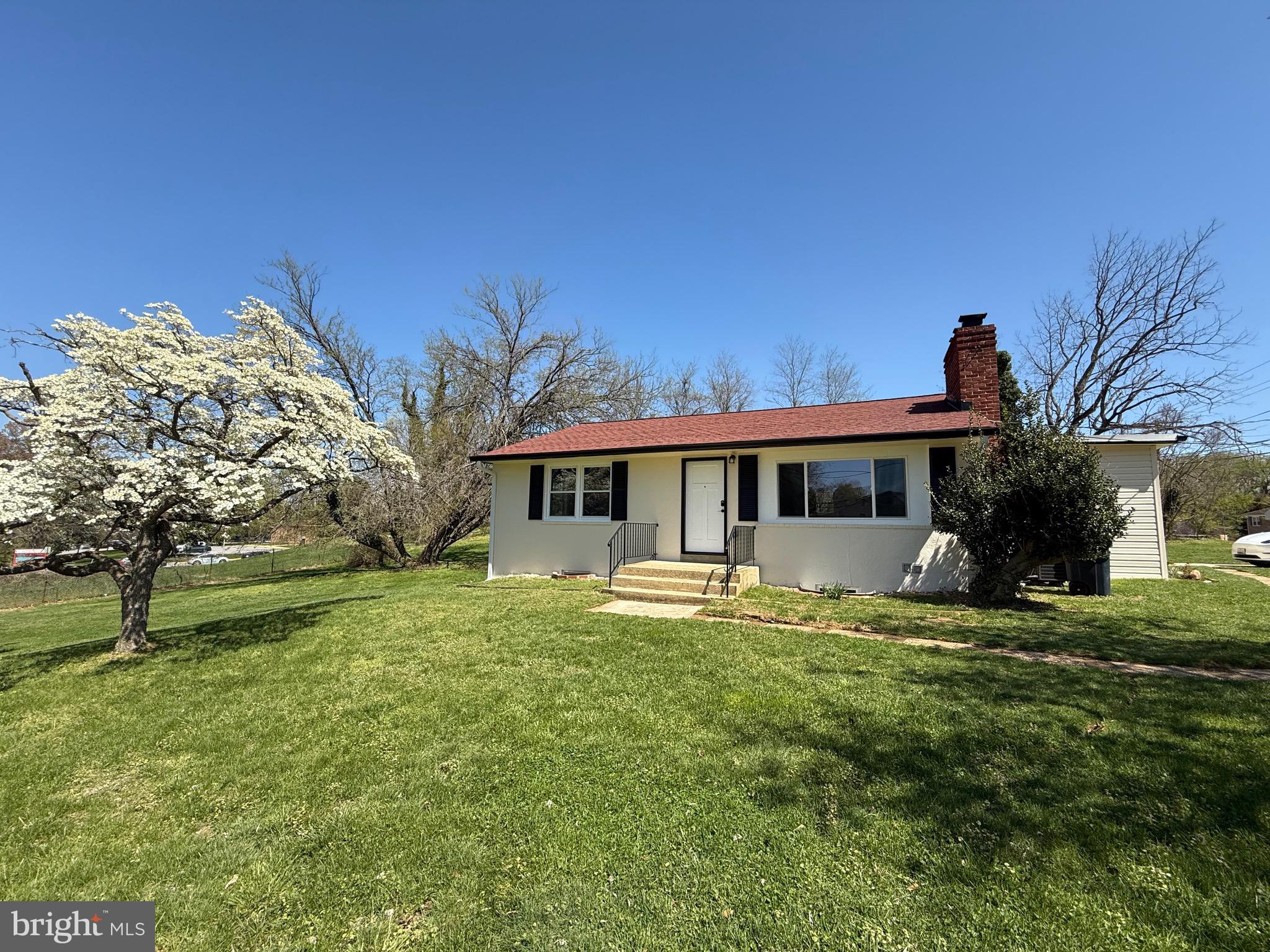 2600 Kingsway Road Fort Washington, MD 20744 - Photo 2 of 37 a view of house with outdoor space and garden
