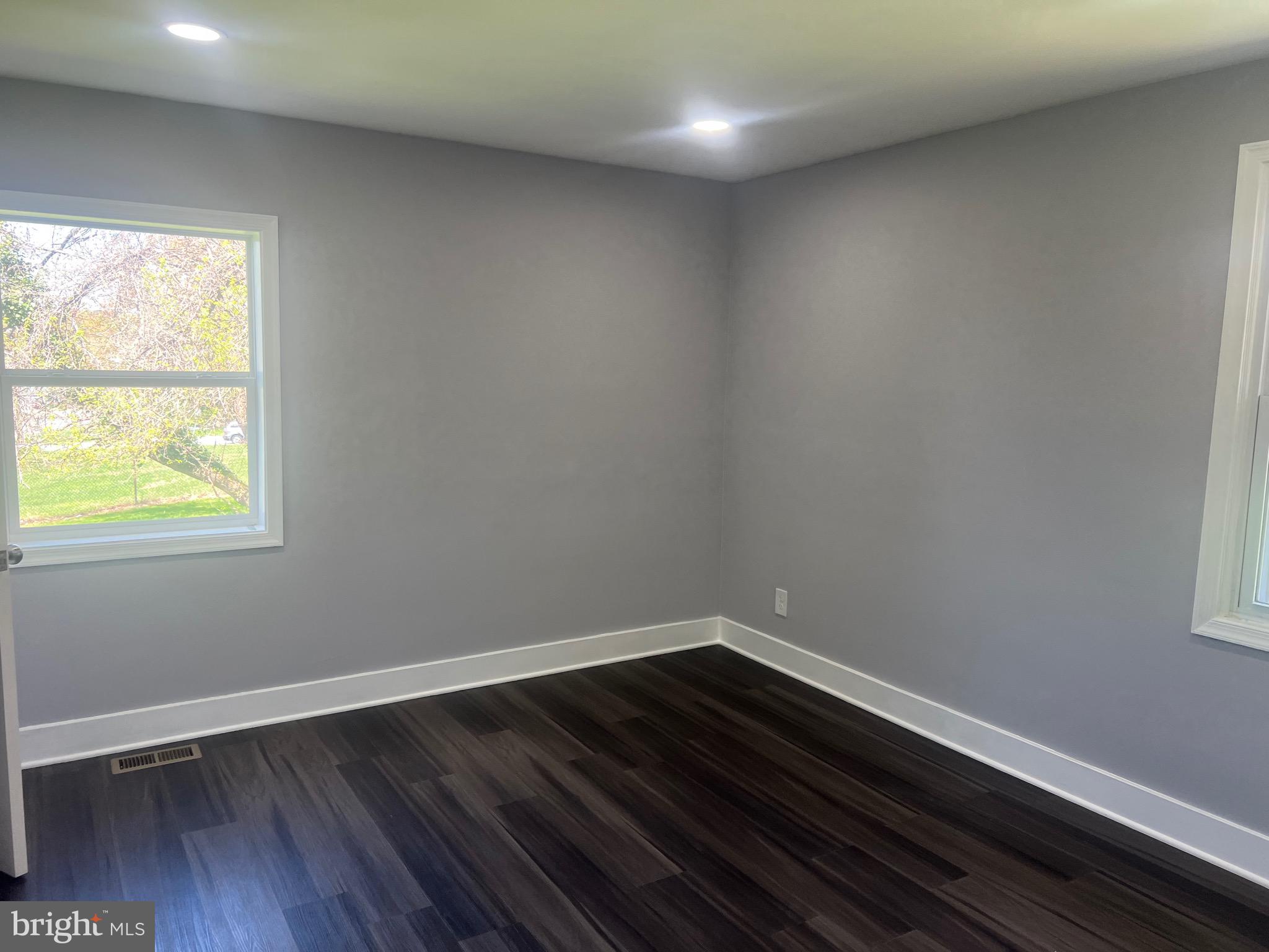 2600 Kingsway Road Fort Washington, MD 20744 - Photo 21 of 37 a room with wooden floor and window